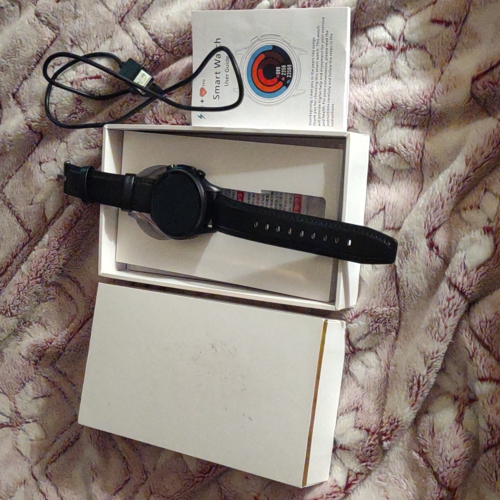 Smart Watch brand new in box comes with charger and instructions